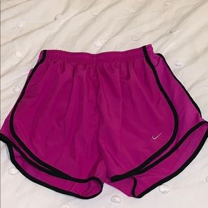 Nike running shorts (color: pink and black)